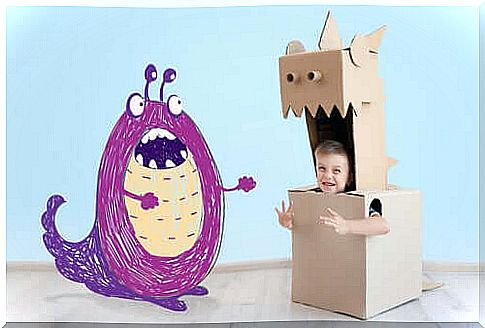 A monster and a child in a cardboard box