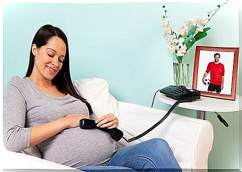 pregnant woman baby on the phone