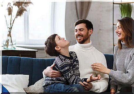 A father and his son playing together.