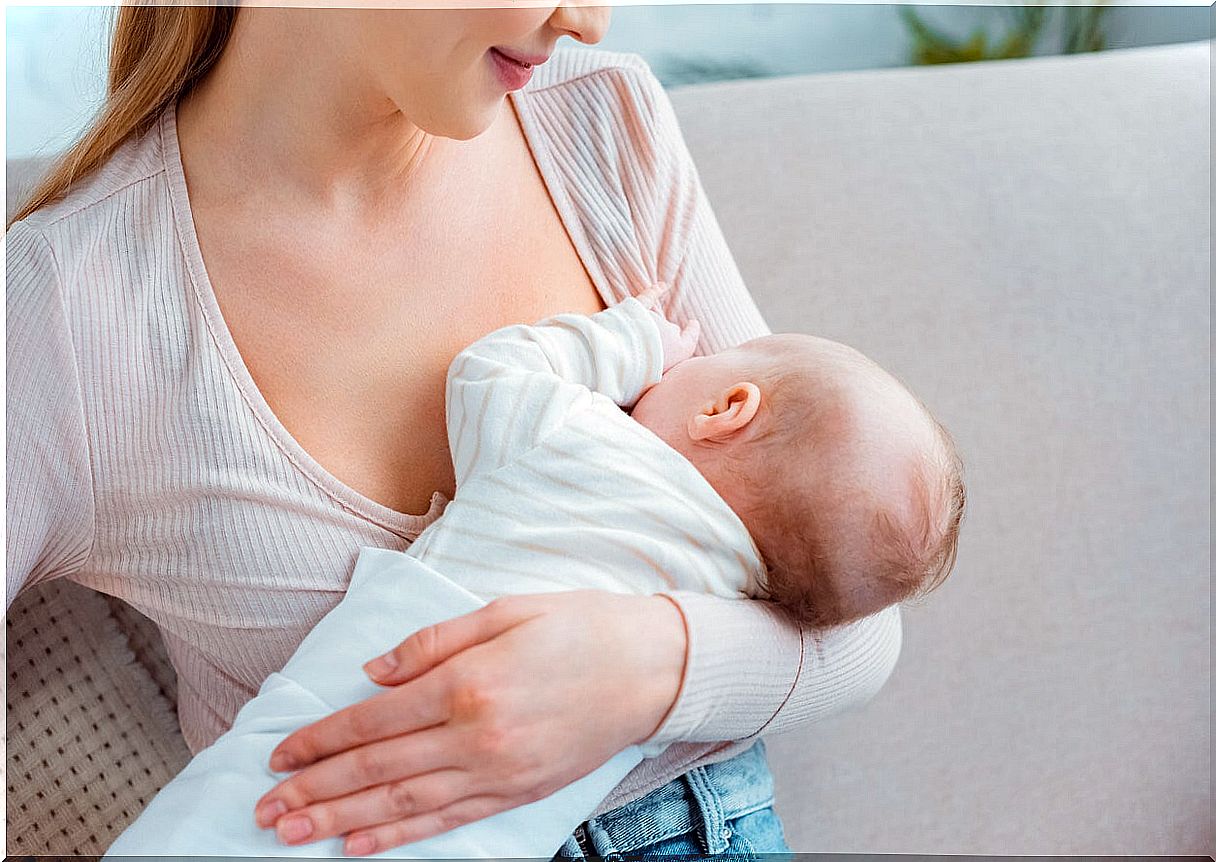 Woman breastfeeding her baby.