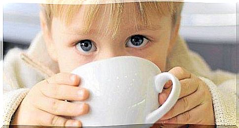 A child drinks coffee