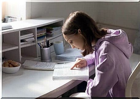 A young girl studying. 