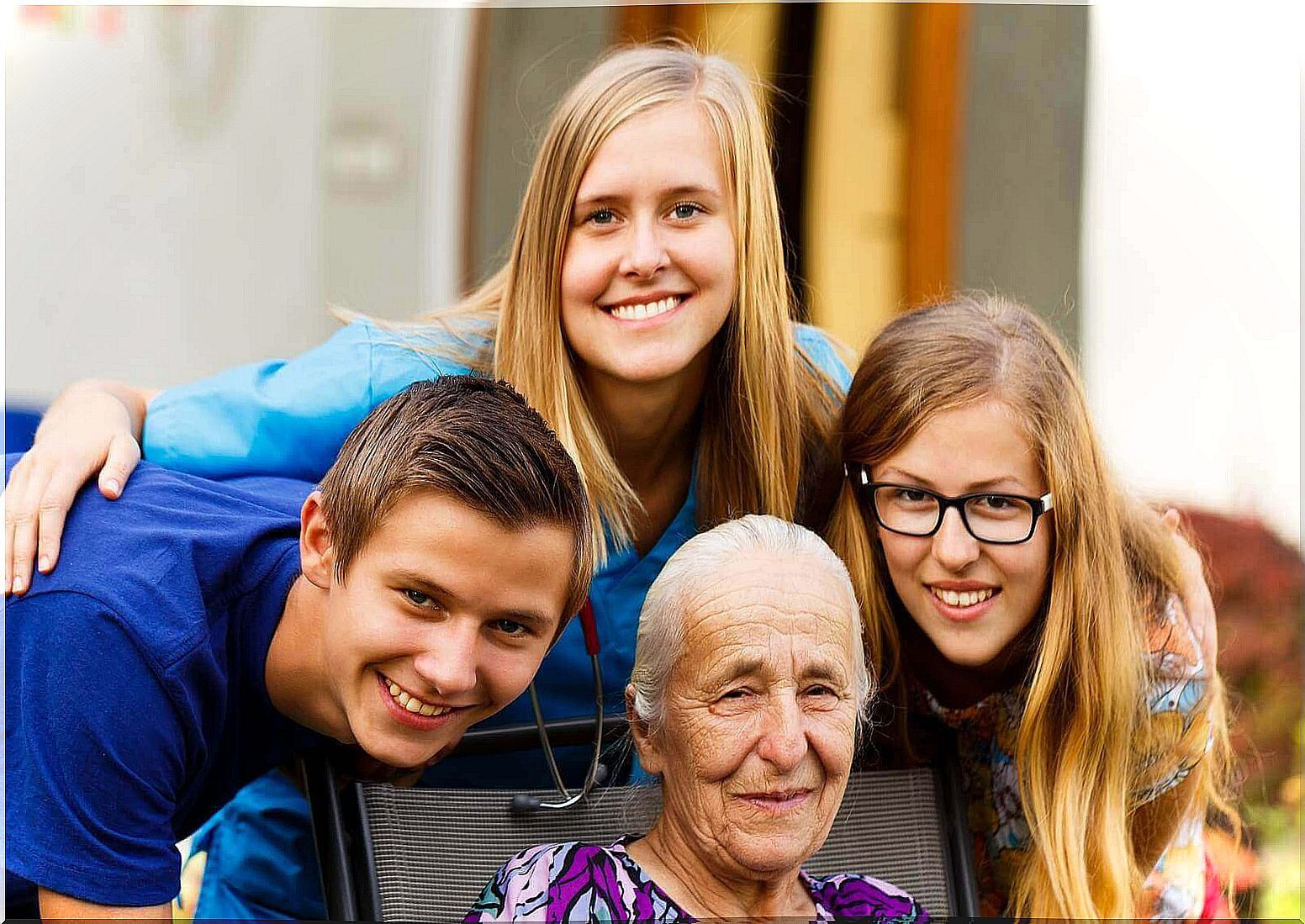 Grandchildren with their grandmother.