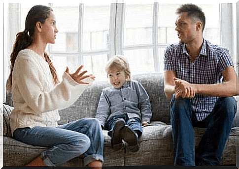 parents arguing in front of their child