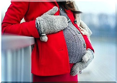 Pregnant woman in winter outfit