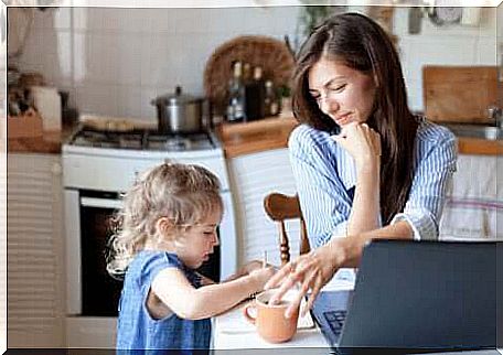 A girl bringing coffee to her mother.